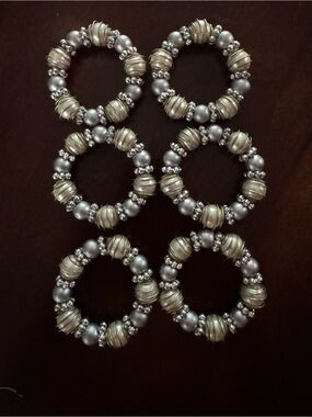 Six Silver and Pearl Napkin Rings (6)